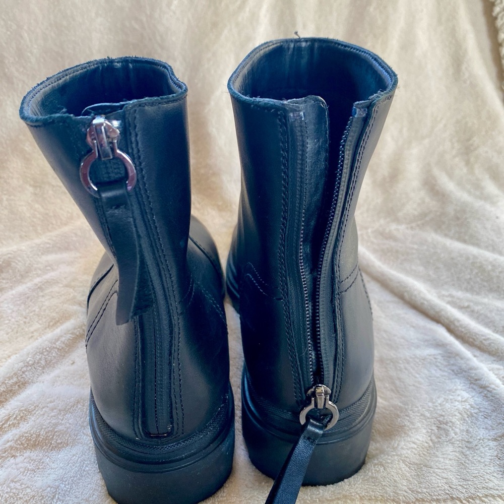 Black leather ankle boots , size 8m, soft black lining, Like new never worn.